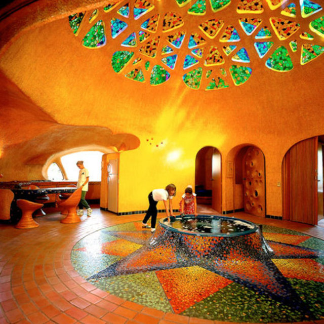 Интерьер общей комнаты органического дома Цветок